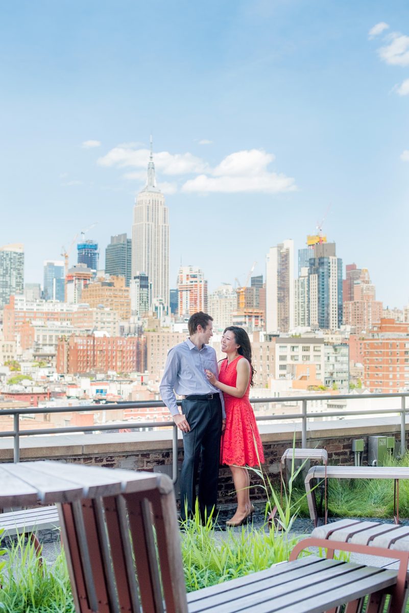 New York City pictures with a beautiful, fun couple with modern style. From a classic round diamond ring to sweet kisses with the Manhattan Skyline, Mikkel Paige Photography took them around western, lower NYC photographing their love at Google headquarters and Washington Square Park for engagement photos. #MikkelPaige #NYCengagementphotos #NewYorkCityEngagementPhotos #NYCengagementpictures