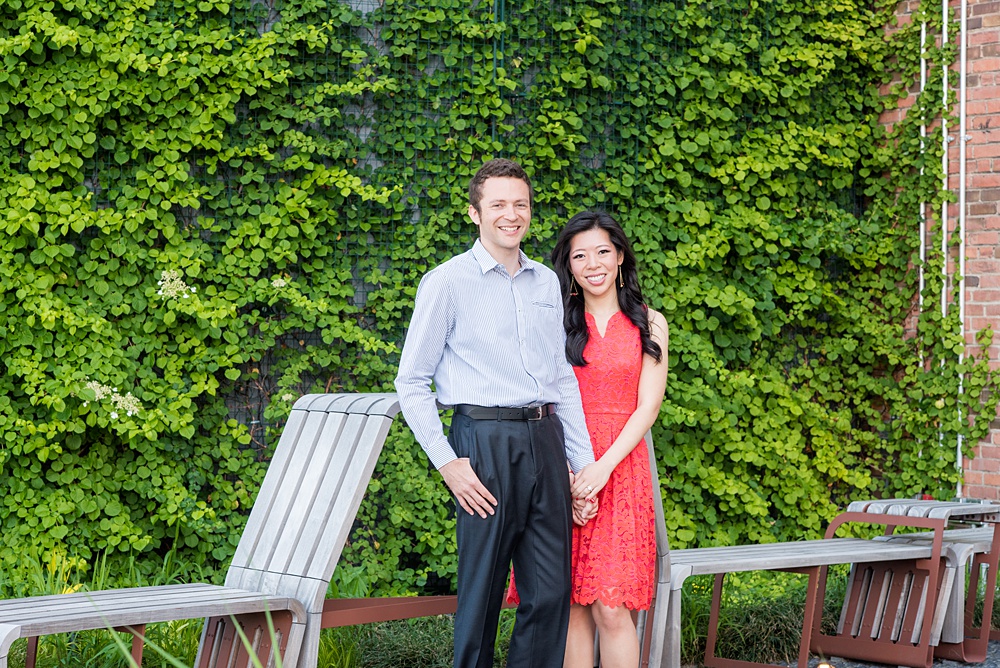 New York City pictures with a beautiful, fun couple with modern style. From a classic round diamond ring to sweet kisses with the Manhattan Skyline, Mikkel Paige Photography took them around western, lower NYC photographing their love at Google headquarters and Washington Square Park for engagement photos. #MikkelPaige #NYCengagementphotos #NewYorkCityEngagementPhotos #NYCengagementpictures