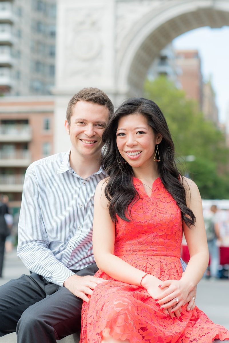 New York City pictures with a beautiful, fun couple with modern style. From a classic round diamond ring to sweet kisses with the Manhattan Skyline, Mikkel Paige Photography took them around western, lower NYC photographing their love at Google headquarters and Washington Square Park for engagement photos. #MikkelPaige #NYCengagementphotos #NewYorkCityEngagementPhotos #NYCengagementpictures