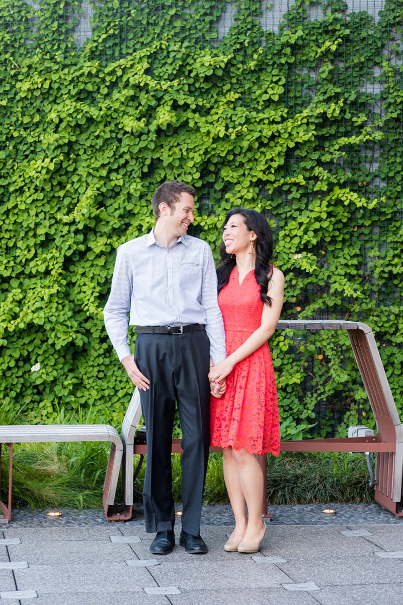 New York City pictures with a beautiful, fun couple with modern style. From a classic round diamond ring to sweet kisses with the Manhattan Skyline, Mikkel Paige Photography took them around western, lower NYC photographing their love at Google headquarters and Washington Square Park for engagement photos. #MikkelPaige #NYCengagementphotos #NewYorkCityEngagementPhotos #NYCengagementpictures