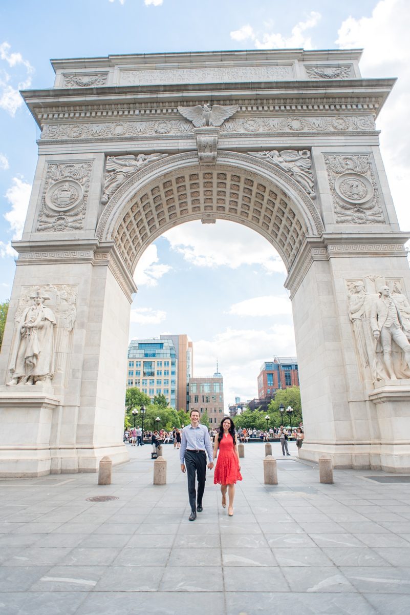 New York City pictures with a beautiful, fun couple with modern style. From a classic round diamond ring to sweet kisses with the Manhattan Skyline, Mikkel Paige Photography took them around western, lower NYC photographing their love at Google headquarters and Washington Square Park for engagement photos. #MikkelPaige #NYCengagementphotos #NewYorkCityEngagementPhotos #NYCengagementpictures