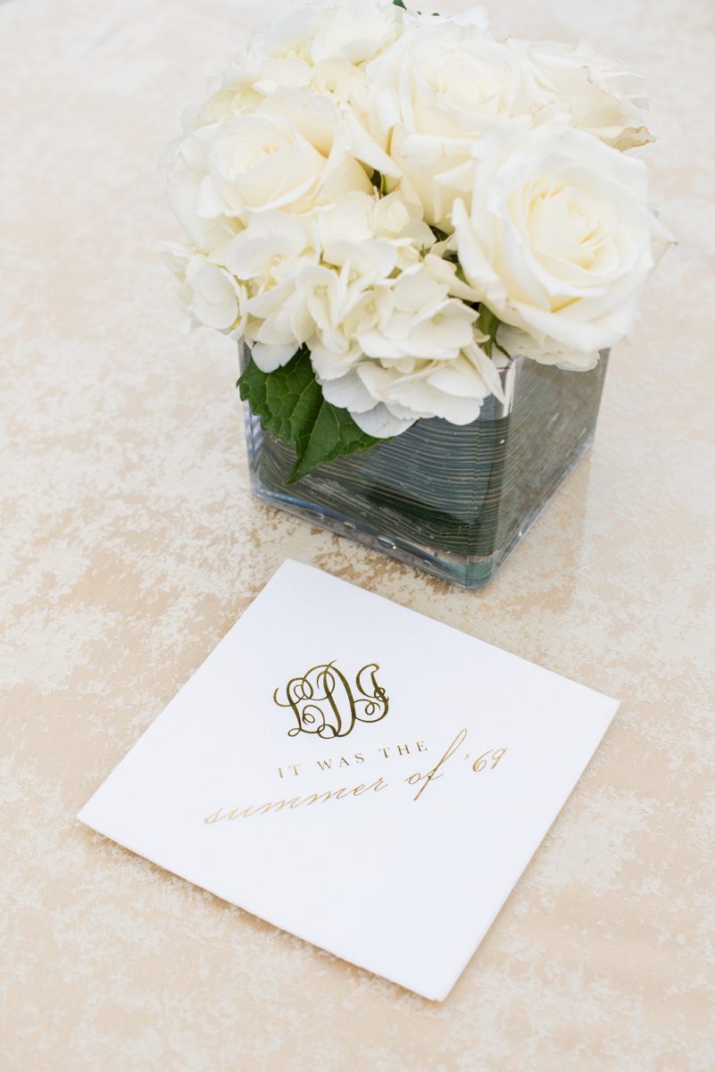 Photographs at New Jersey wedding venue, Temple Emanu-el, by Mikkel Paige Photography, with kosher catering for a golden 50th anniversary celebration. Decor with metallic and white flowers for the romantic space. Fun-loving couple providing beautiful inspiration with cute signs, table numbers and giveaways. All paper and signs by @suitepaperie. #mikkelpaige #newjerseyweddingphotographer #newjerseyweddingvenue #njweddings #njweddingphotographers