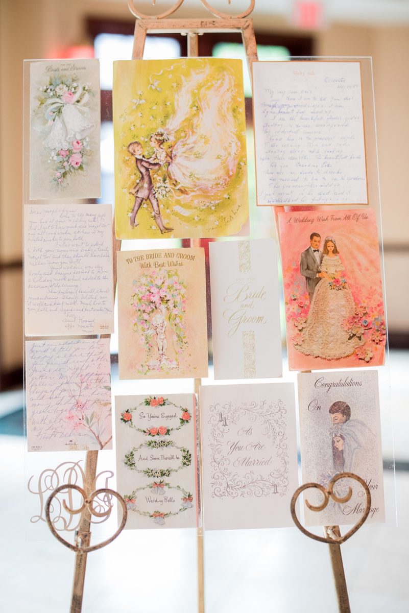 Photographs at New Jersey wedding venue, Temple Emanu-el, by Mikkel Paige Photography, with kosher catering for a golden 50th anniversary celebration. Decor with metallic and white flowers for the romantic space. Fun-loving couple providing beautiful inspiration with cute signs, table numbers and giveaways. All paper and signs by @suitepaperie. #mikkelpaige #newjerseyweddingphotographer #newjerseyweddingvenue #njweddings #njweddingphotographers