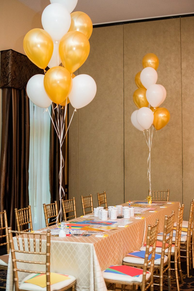 Photographs at New Jersey wedding venue, Temple Emanu-el, by Mikkel Paige Photography, with kosher catering for a golden 50th anniversary celebration. Decor with metallic and white flowers for the romantic space. Fun-loving couple providing beautiful inspiration with cute signs, table numbers and giveaways. All paper and signs by @suitepaperie. #mikkelpaige #newjerseyweddingphotographer #newjerseyweddingvenue #njweddings #njweddingphotographers