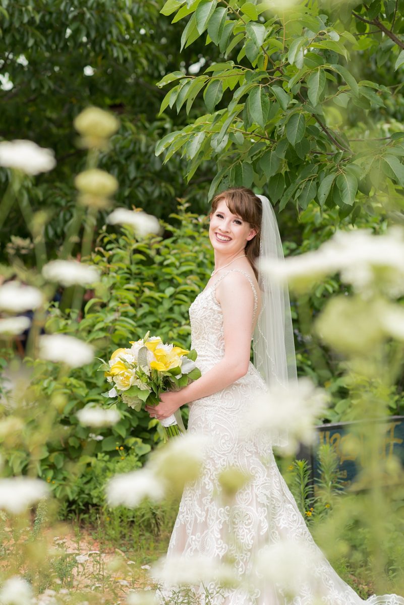 Durham's The Rickhouse wedding venue pictures by Mikkel Paige Photography. The couple got ready at 21c Museum Hotel downtown in the city center then traveled to the indoor/outdoor venue for their ceremony and reception. #durhamvenues #northcarolinaweddings #mikkelpaige #durhamweddingphotos #durhamweddingphotographer