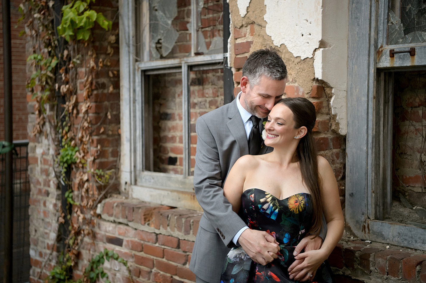 Mikkel Paige Photography's wedding photos - an elopement in downtown Raleigh, North Carolina - with a white bouquet by @meristemfloral, beauty by Wink Hair and Makeup and photos by Brian Mullins Photography.