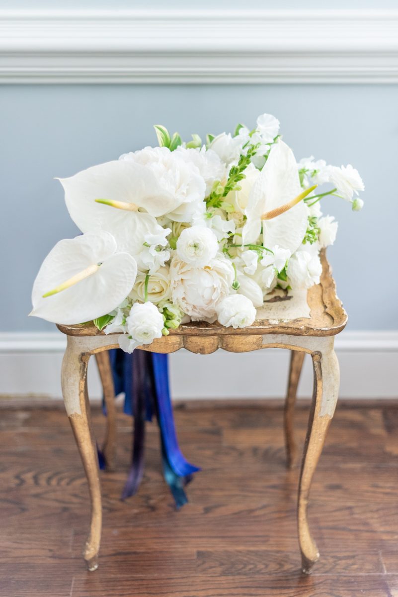 Mikkel Paige Photography's wedding photos - an elopement in downtown Raleigh, North Carolina - with a white bouquet by @meristemfloral, beauty by Wink Hair and Makeup and detail photos by Mikkel Paige Photography.