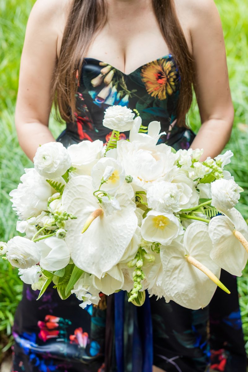 Mikkel Paige Photography's wedding photos - an elopement in downtown Raleigh, North Carolina - with a white bouquet by @meristemfloral, beauty by Wink Hair and Makeup and detail photos by Mikkel Paige Photography.