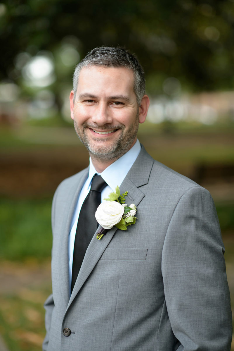 Mikkel Paige Photography's wedding photos - an elopement in downtown Raleigh, North Carolina - with a white bouquet by @meristemfloral, beauty by Wink Hair and Makeup and photos by Brian Mullins Photography.