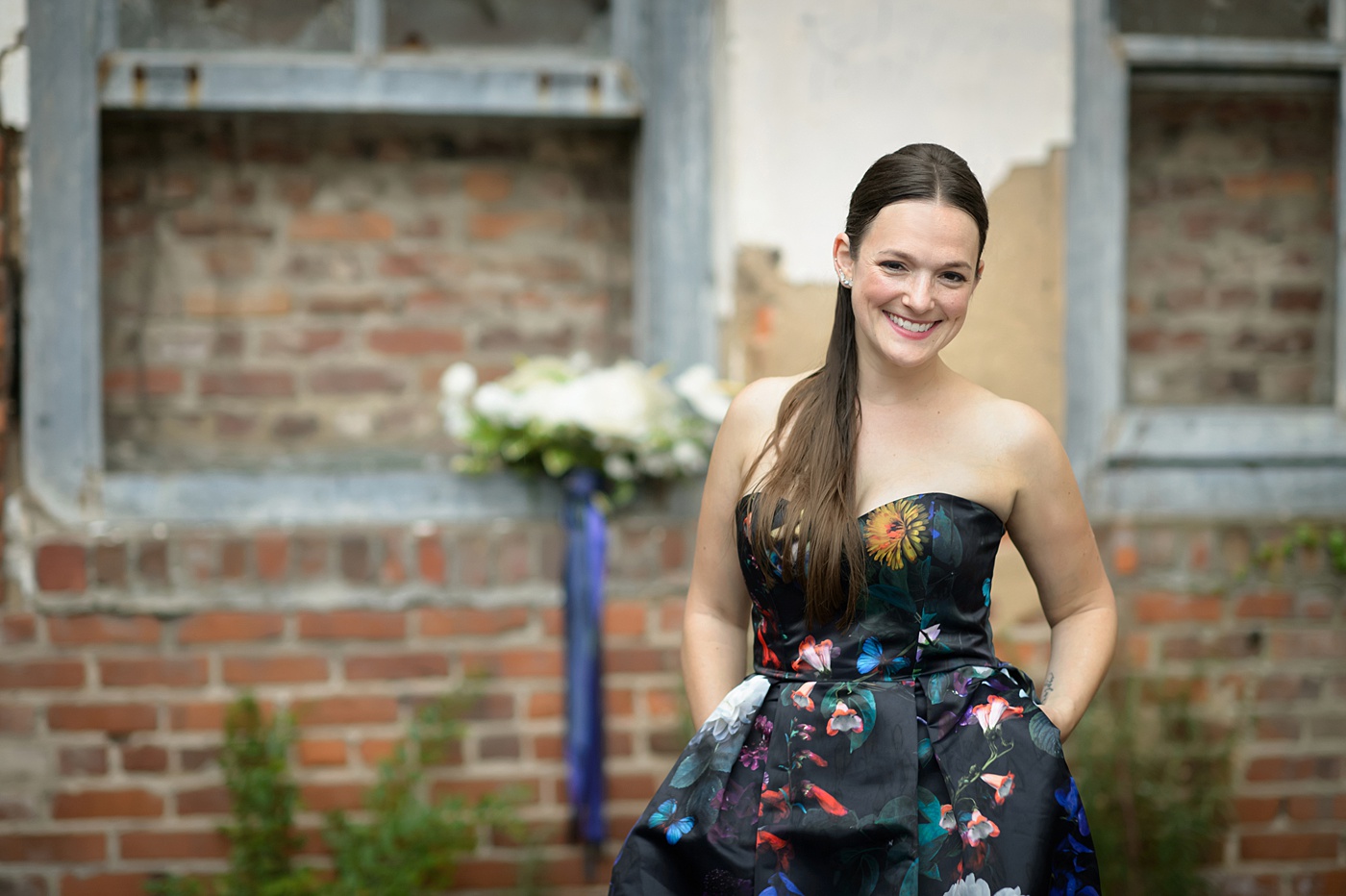 Mikkel Paige Photography's wedding photos - an elopement in downtown Raleigh, North Carolina - with a white bouquet by @meristemfloral, beauty by Wink Hair and Makeup and photos by Brian Mullins Photography.