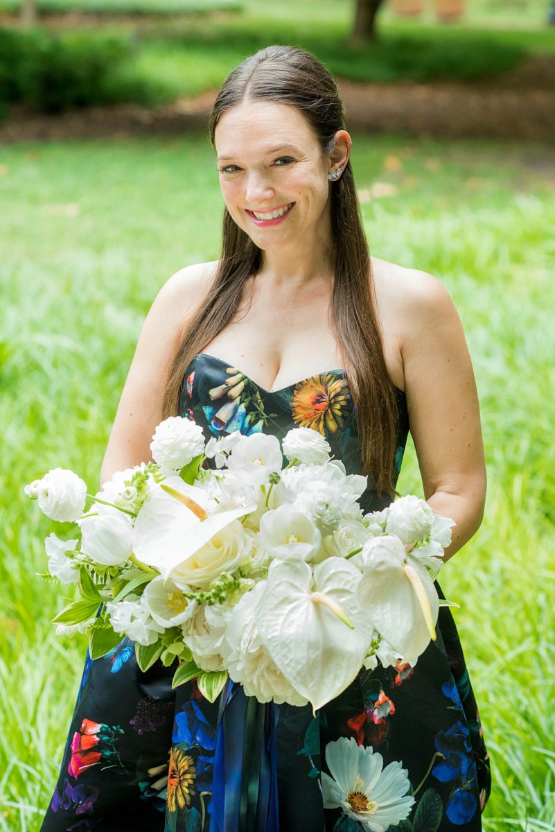 Mikkel Paige Photography's wedding photos - an elopement in downtown Raleigh, North Carolina - with a white bouquet by @meristemfloral, beauty by Wink Hair and Makeup and detail photos by Mikkel Paige Photography.