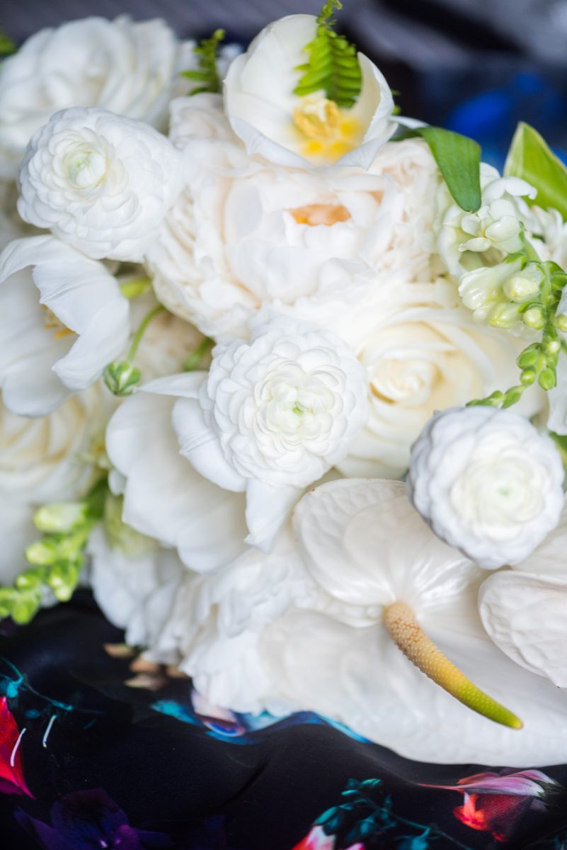 Mikkel Paige Photography's wedding photos - an elopement in downtown Raleigh, North Carolina - with a white bouquet by @meristemfloral, beauty by Wink Hair and Makeup and detail photos by Mikkel Paige Photography.