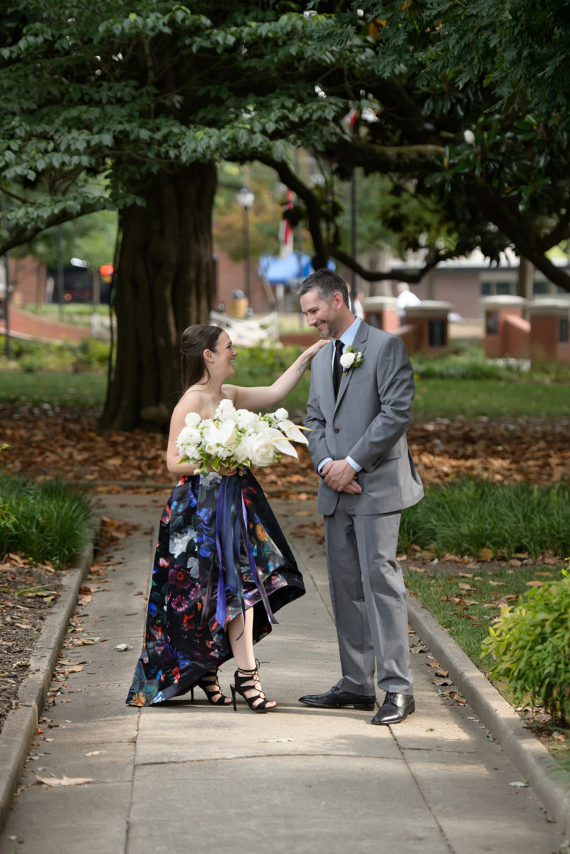 Mikkel Paige Photography's wedding photos - an elopement in downtown Raleigh, North Carolina - with a white bouquet by @meristemfloral, beauty by Wink Hair and Makeup and photos by Brian Mullins Photography.