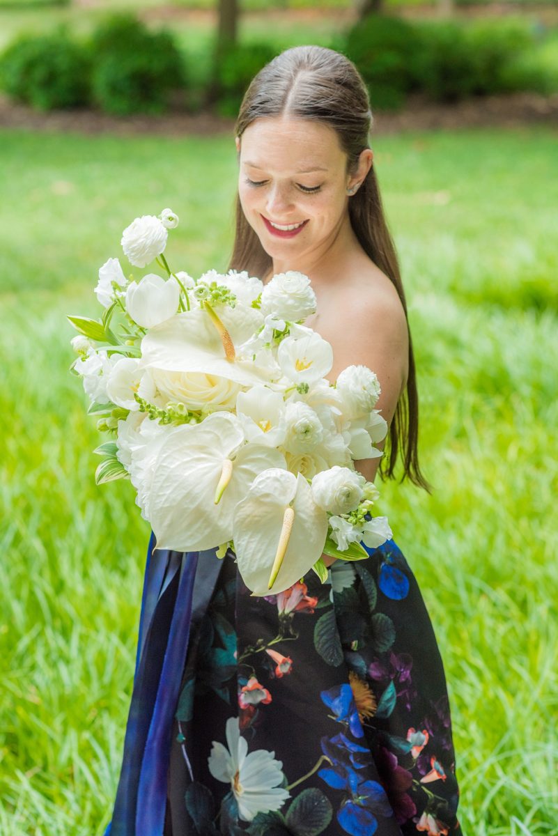 Mikkel Paige Photography's wedding photos - an elopement in downtown Raleigh, North Carolina - with a white bouquet by @meristemfloral, beauty by Wink Hair and Makeup and detail photos by Mikkel Paige Photography.