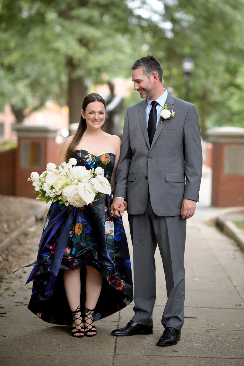 Mikkel Paige Photography's wedding photos - an elopement in downtown Raleigh, North Carolina - with a white bouquet by @meristemfloral, beauty by Wink Hair and Makeup and photos by Brian Mullins Photography. 