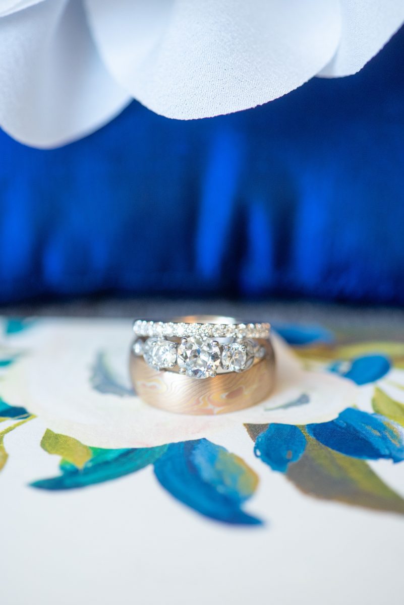 Detail photo of the bride and groom's rings from a wedding at New Jersey venue Crystal Springs Resort by Mikkel Paige Photography. This NJ event space has a beautiful outdoor area for the ceremony! #mikkelpaige #crystalsprings #golfcoursevenue #newjerseyweddingvenue