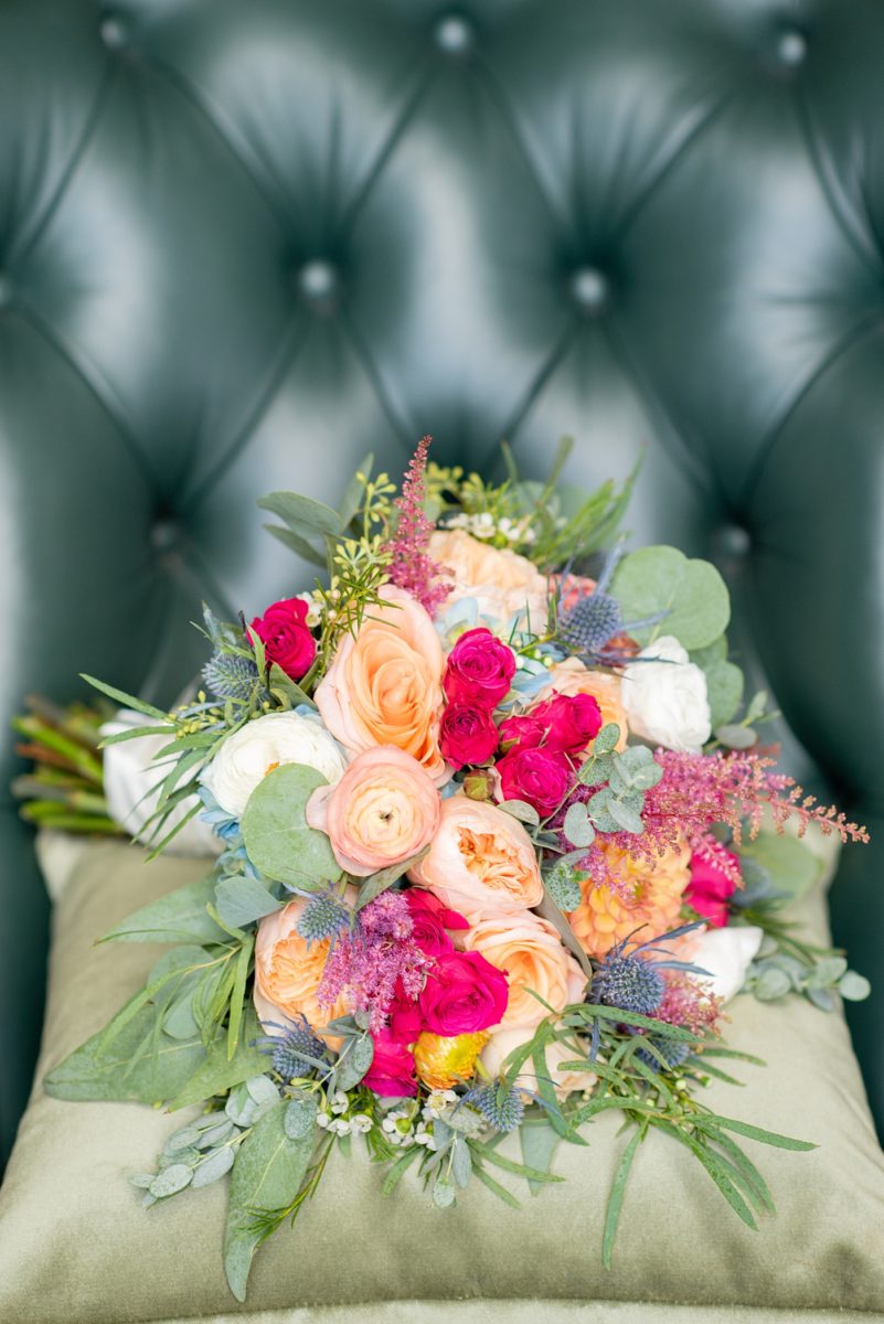 Detail photo of the bride's colorful fall bouquet from a wedding at New Jersey venue Crystal Springs Resort by Mikkel Paige Photography. This NJ event space has a beautiful outdoor area for the ceremony! #mikkelpaige #crystalsprings #golfcoursevenue #newjerseyweddingvenue #fallbouquet