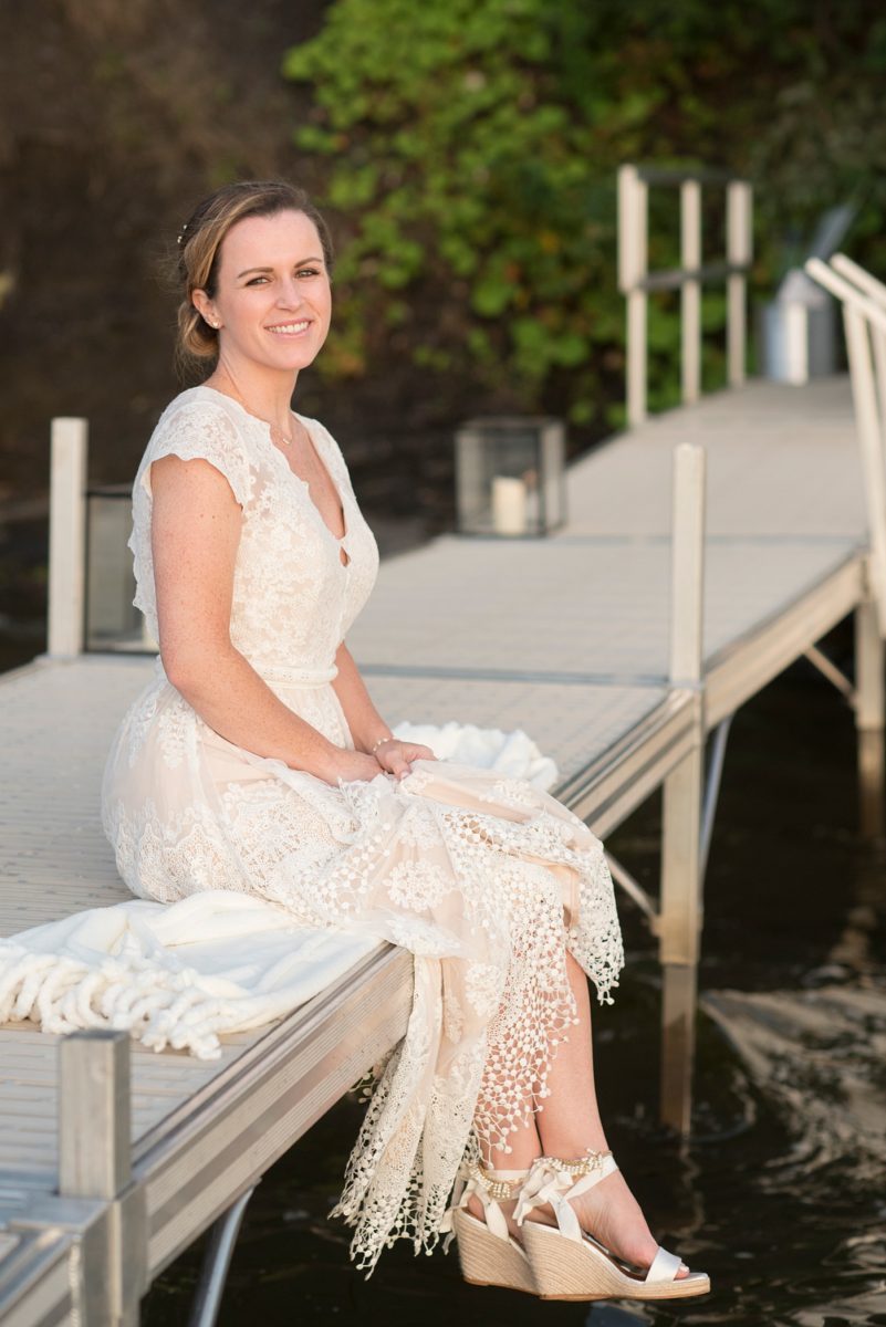 Saratoga Springs waterfront wedding photos by Mikkel Paige Photography. The bride and groom created a venue from a rental property and had an "at home" style celebration at a lakehouse. #SaratogaSprings #lakefrontwedding #lakewedding #mikkelpaige