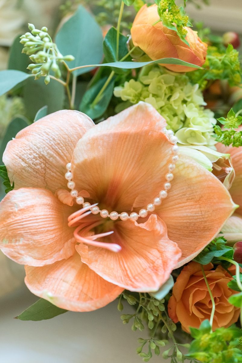 Crabtree's Kittle House wedding photos by Mikkel Paige Photography of a fall wedding in Chappaqua, New York. This is a beautiful indoor and outdoor wedding venue in Westchester county! #mikkelpaige #westchesterweddingvenues #westchesterweddingphotographers #pearlbracelet