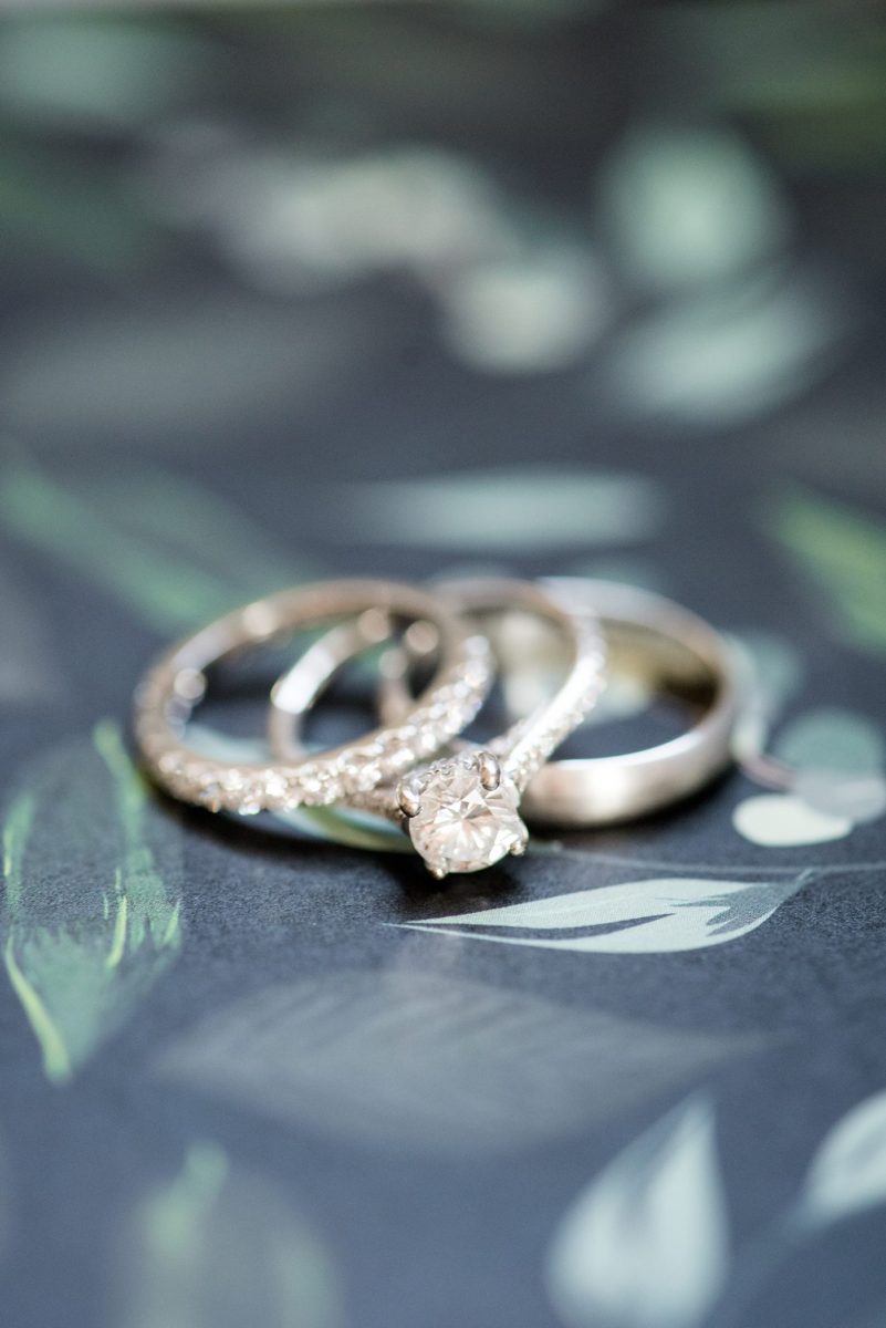 A wedding at Crabtree's Kittle House in Chappaqua, New York. Detail photos of the white gold rings by Mikkel Paige Photography. This venue in Westchester County is near the Hudson Valley and NYC. #mikkelpaige #hudsonvalleyweddings #crabtreeskittlehouse #fallwedding #westchestervenues #detailphotos #weddingday #ringshots #ringphotos #weddingrings