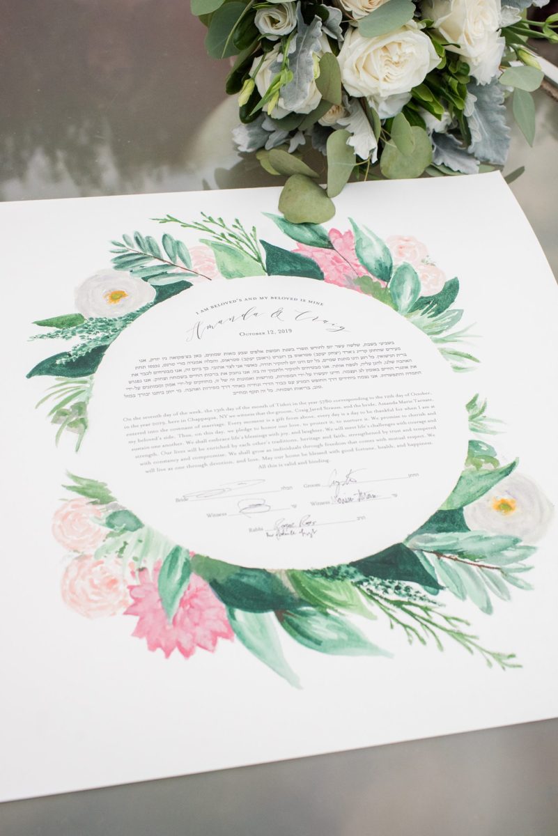 A custom ketubah was watercolored by the bride's friend for an outdoor ceremony at Crabtree's Kittle House in Chappaqua, New York. Photos by Mikkel Paige Photography. This venue in Westchester County is near the Hudson Valley and NYC. The bride and groom incorporated a Rabbi and Priest, and Jewish and Filipino traditions. #mikkelpaige #hudsonvalleyweddings #crabtreeskittlehouse #fallwedding #westchestervenues #ketubah #Jewishwedding