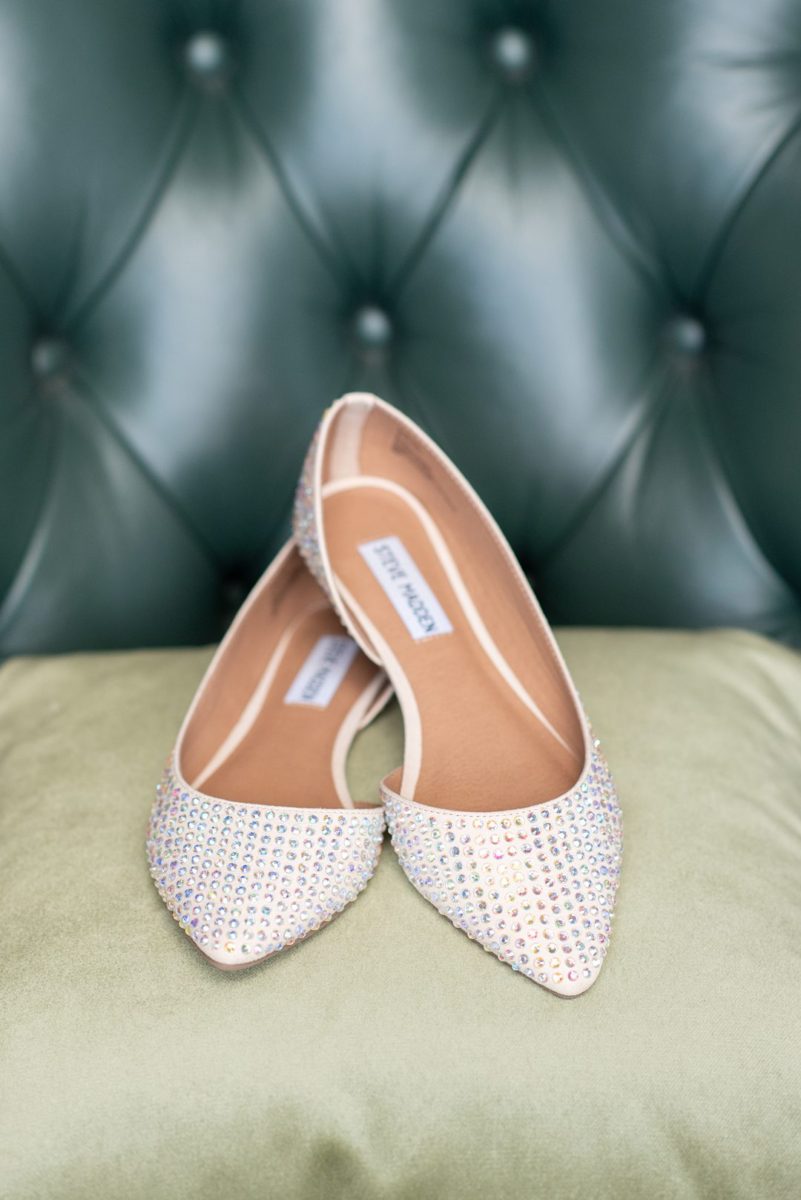 New Jersey wedding venue, Crystal Springs Resort, in Hamburg with an outdoor ceremony option and indoor reception. This detail photo of the bride's flat rhinestone shoes is by Mikkel Paige Photography. #mikkelpaige #CrystalSprings #NJweddingvenues #NewJerseyWedding #NJweddingphotographer #weddingshoes #detailshots #detailphotos