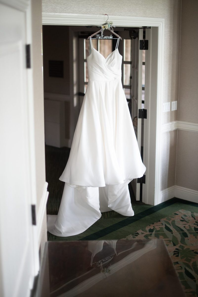 New Jersey wedding venue, Crystal Springs Resort, in Hamburg with an outdoor ceremony option and indoor reception. This detail photo of the bride's gown is by Mikkel Paige Photography. #mikkelpaige #CrystalSprings #NJweddingvenues #NewJerseyWedding #NJweddingphotographer #weddinggown #detailshots #detailphotos