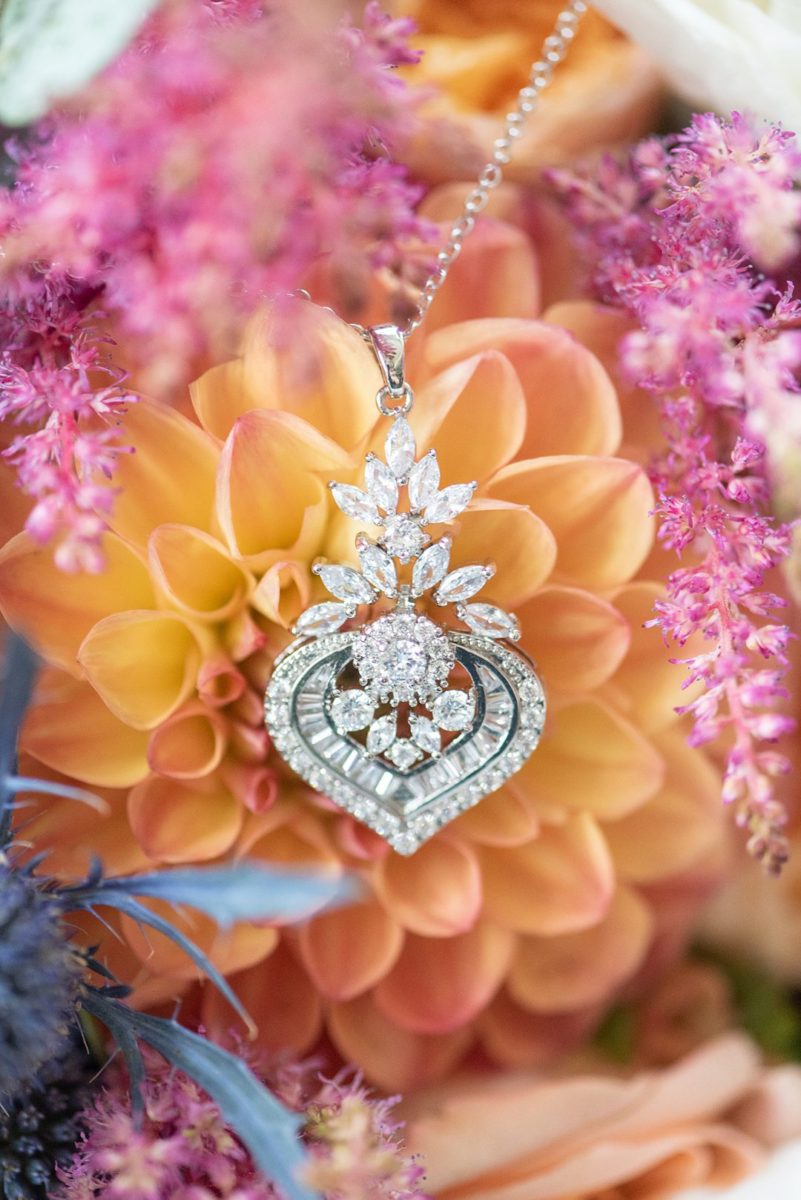 New Jersey wedding venue, Crystal Springs Resort, in Hamburg with an outdoor ceremony option and indoor reception. This detail photo of the bride's diamond necklace is by Mikkel Paige Photography. #mikkelpaige #CrystalSprings #NJweddingvenues #NewJerseyWedding #NJweddingphotographer #weddingnecklace #detailshots #detailphotos