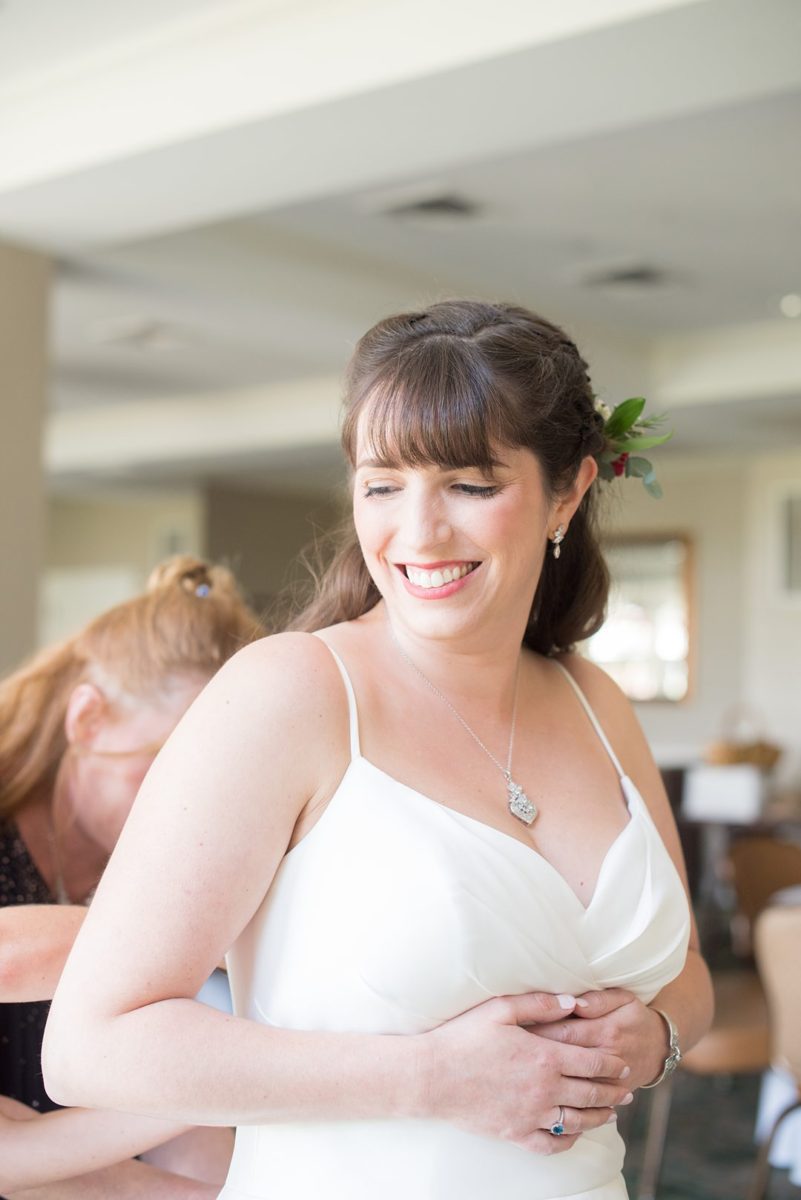 New Jersey wedding venue, Crystal Springs Resort, in Hamburg with an outdoor ceremony option and indoor reception. Photos by Mikkel Paige Photography. The bride wore a simple classic white dress with flowers in her hair. #mikkelpaige #CrystalSprings #NJweddingvenues #NewJerseyWedding #NJweddingphotographer #bridestyle