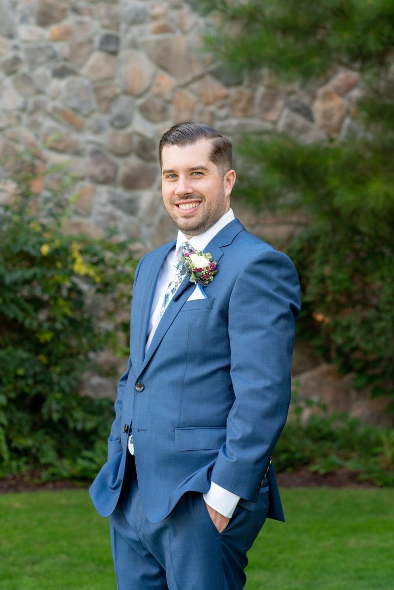 New Jersey wedding venue, Crystal Springs Resort, in Hamburg with an outdoor ceremony option and indoor reception. Photos by Mikkel Paige Photography. The groom wore a blue suit and floral tie. #mikkelpaige #CrystalSprings #NJweddingvenues #NewJerseyWedding #NJweddingphotographer #groomstyle