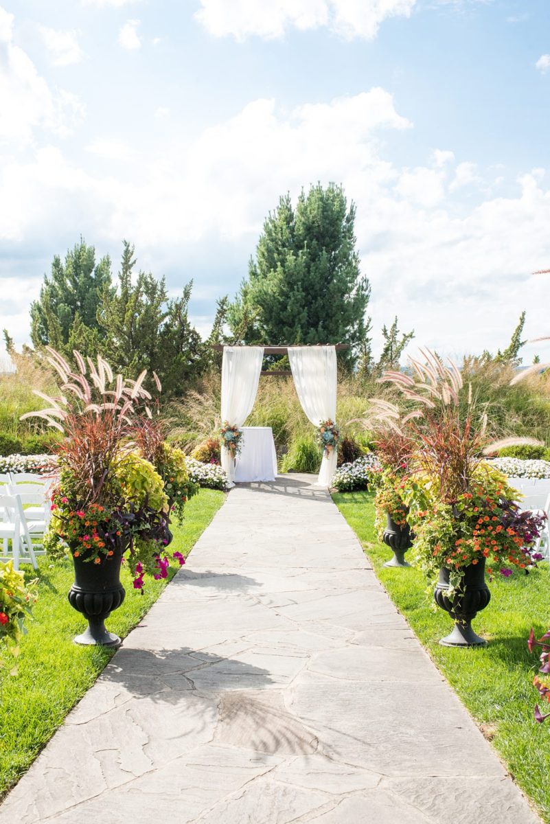 Photos at New Jersey wedding venue, Crystal Springs Resort, in Hamburg with an outdoor ceremony option and indoor reception, by Mikkel Paige Photography. The bride and groom literally tied a knot, a Celtic tradition! #mikkelpaige #CrystalSprings #NJweddingvenues #NewJerseyWedding #NJweddingphotographer #fallwedding #weddingtraditions #tyingtheknot #weddingceremony #ceremonytraditions