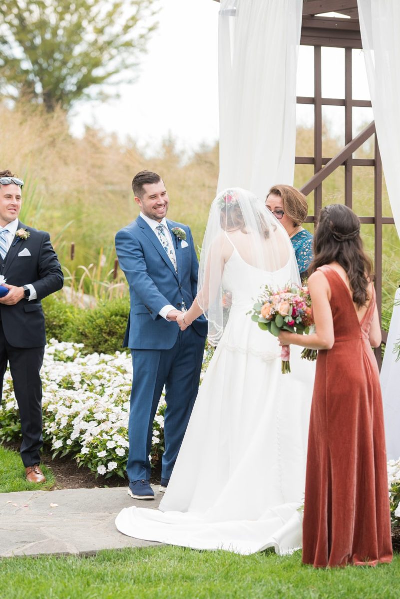 Photos at New Jersey wedding venue, Crystal Springs Resort, in Hamburg with an outdoor ceremony option and indoor reception, by Mikkel Paige Photography. The bride and groom literally tied a knot, a Celtic tradition! #mikkelpaige #CrystalSprings #NJweddingvenues #NewJerseyWedding #NJweddingphotographer #fallwedding #weddingtraditions #tyingtheknot #weddingceremony #ceremonytraditions