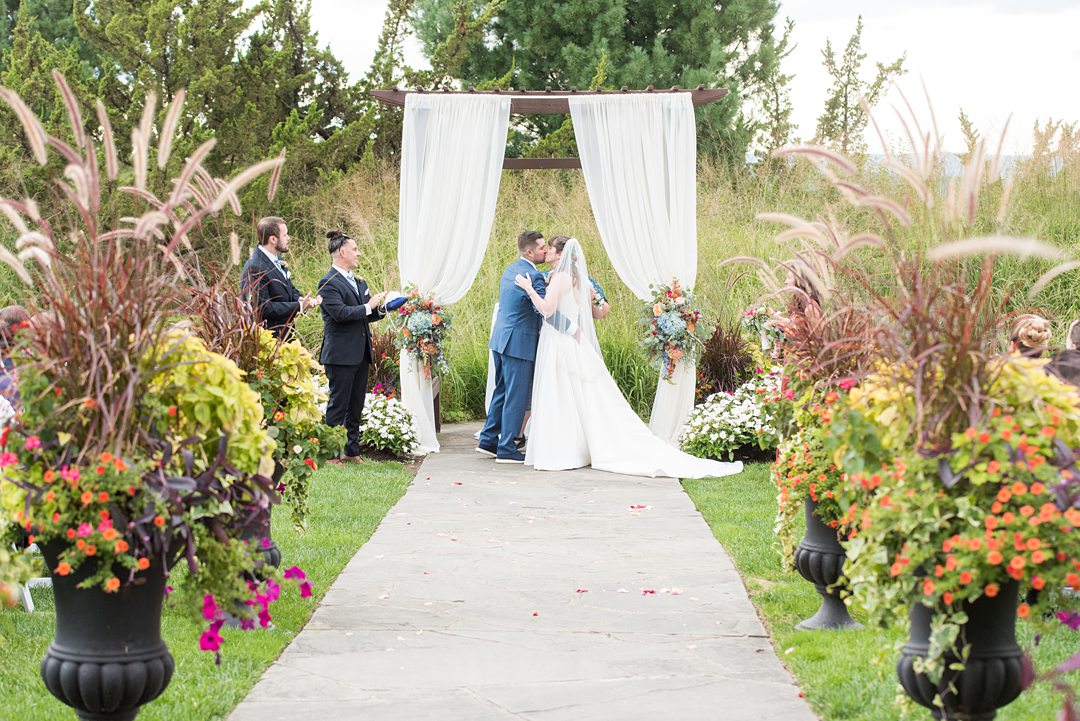 Photos at New Jersey wedding venue, Crystal Springs Resort, in Hamburg with an outdoor ceremony option and indoor reception, by Mikkel Paige Photography. The bride and groom literally tied a knot, a Celtic tradition! #mikkelpaige #CrystalSprings #NJweddingvenues #NewJerseyWedding #NJweddingphotographer #fallwedding #weddingtraditions #tyingtheknot #weddingceremony #ceremonytraditions