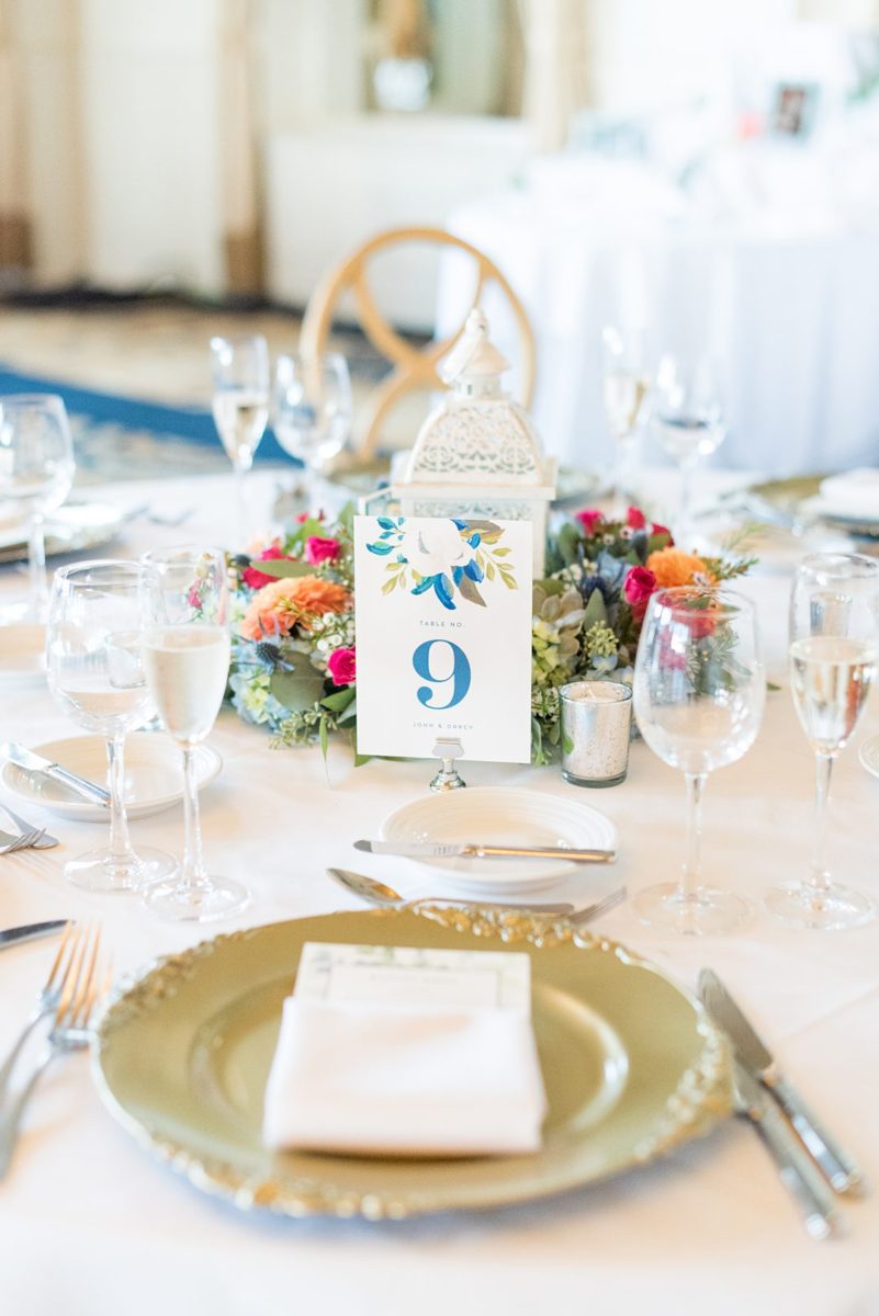 Photos at New Jersey wedding venue, Crystal Springs Resort, in Hamburg with an outdoor ceremony option and indoor reception, by Mikkel Paige Photography. The reception was filled with gold and blue detail, and table numbers to match their stationery suite. #mikkelpaige #CrystalSprings #NJweddingvenues #NewJerseyWedding #NJweddingphotographer #fallwedding #septemberwedding #weddingreception