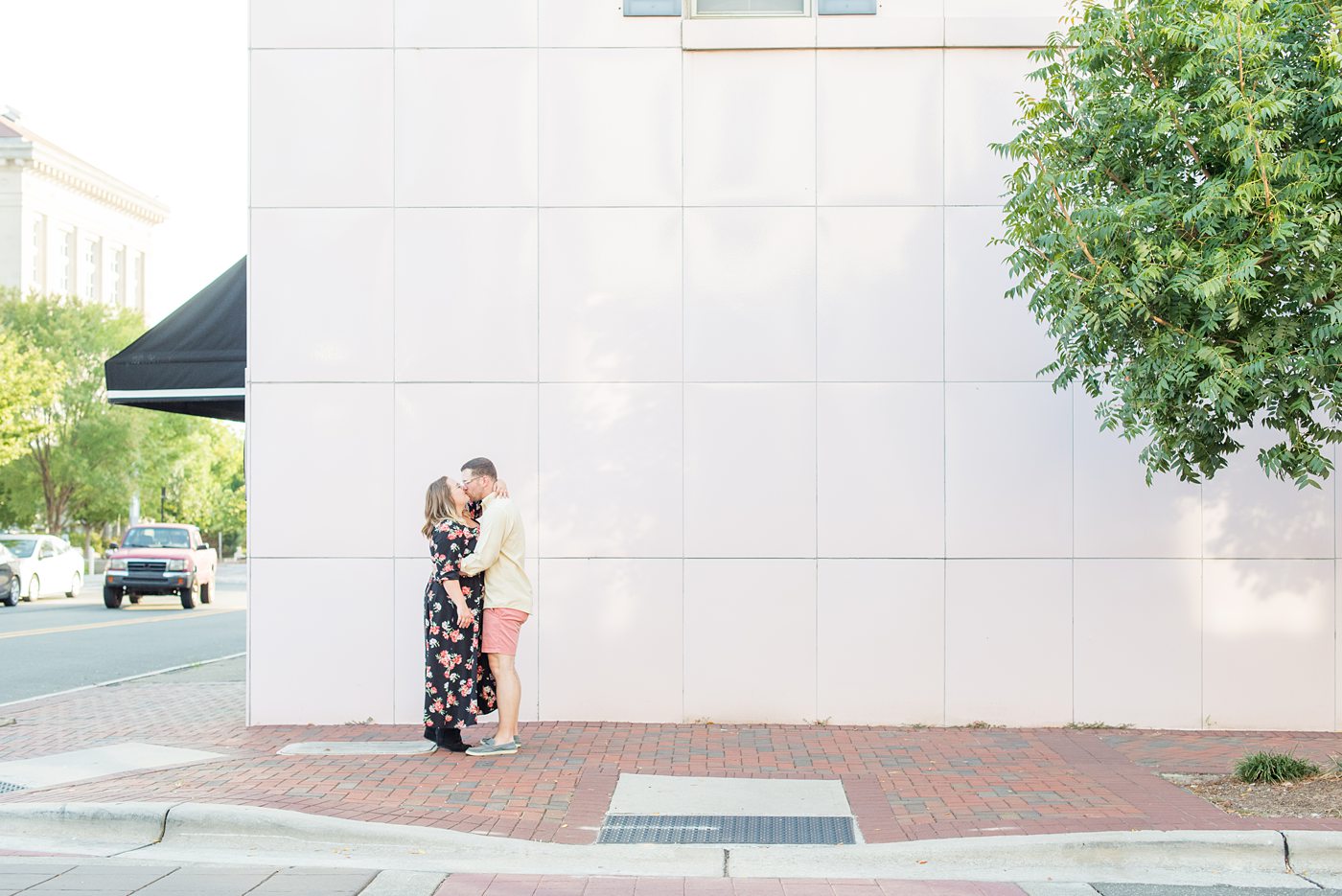 Durham North Carolina wedding photographer, Mikkel Paige Photography, captures engagement-like photos for a couple in the downtown area of this NC city for a two year anniversary couples session with Nikki and her husband, Jason, of Fancy This Photography. #mikkelpaige #DurhamEngagementPhotos #durhamphotographysession #DowntownDurham #DurhamWeddingPhotographer