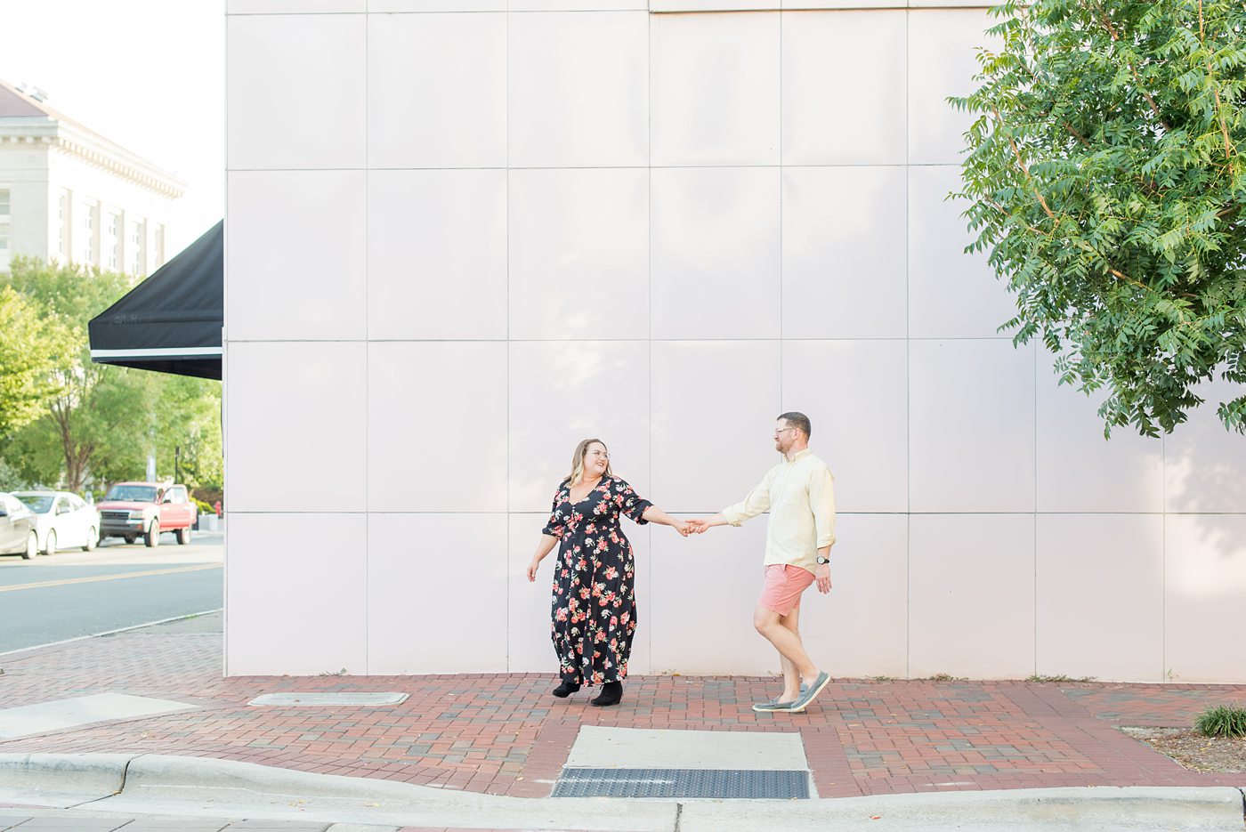 Durham North Carolina wedding photographer, Mikkel Paige Photography, captures engagement-like photos for a couple in the downtown area of this NC city for a two year anniversary couples session with Nikki and her husband, Jason, of Fancy This Photography. #mikkelpaige #DurhamEngagementPhotos #durhamphotographysession #DowntownDurham #DurhamWeddingPhotographer