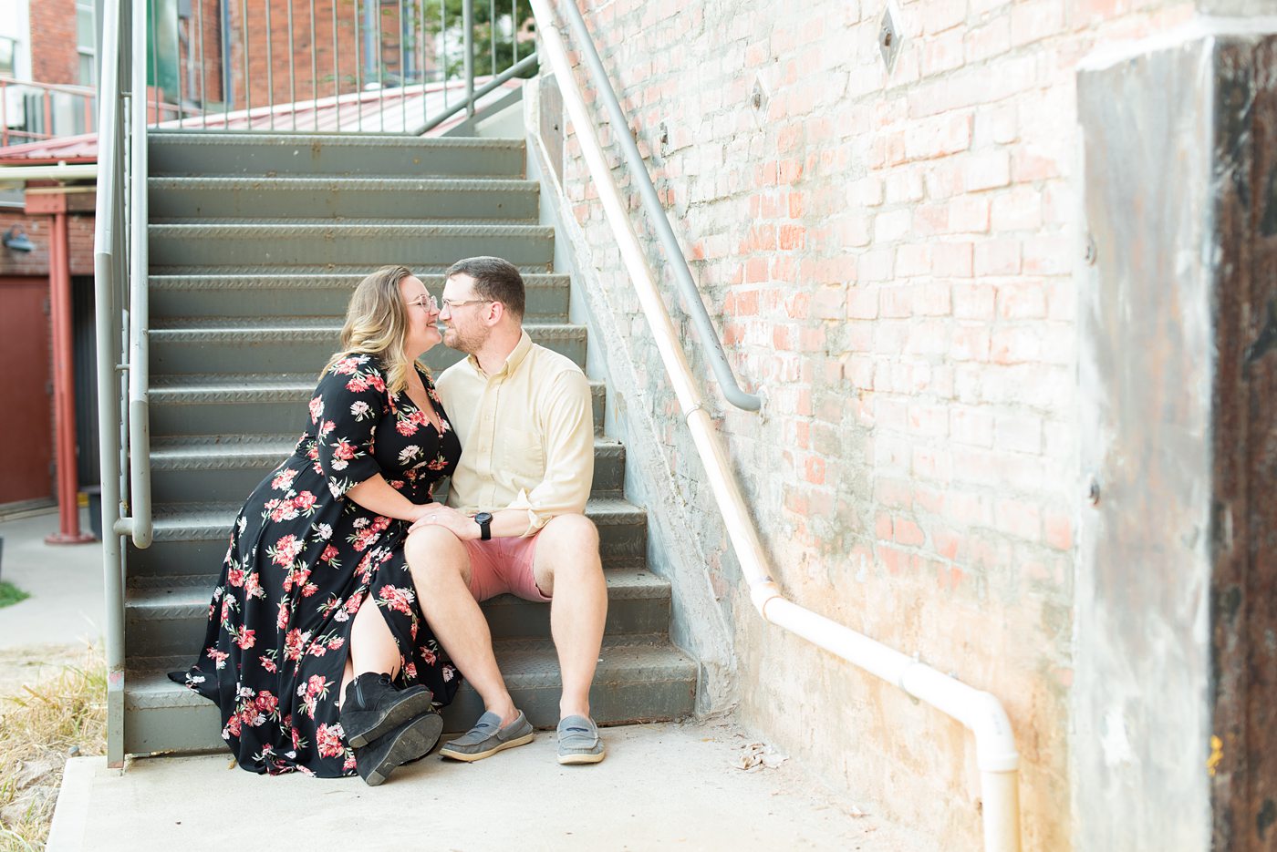 Durham North Carolina wedding photographer, Mikkel Paige Photography, captures engagement-like photos for a couple in the downtown area of this NC city for a two year anniversary couples session with Nikki and her husband, Jason, of Fancy This Photography. #mikkelpaige #DurhamEngagementPhotos #durhamphotographysession #DowntownDurham #DurhamWeddingPhotographer