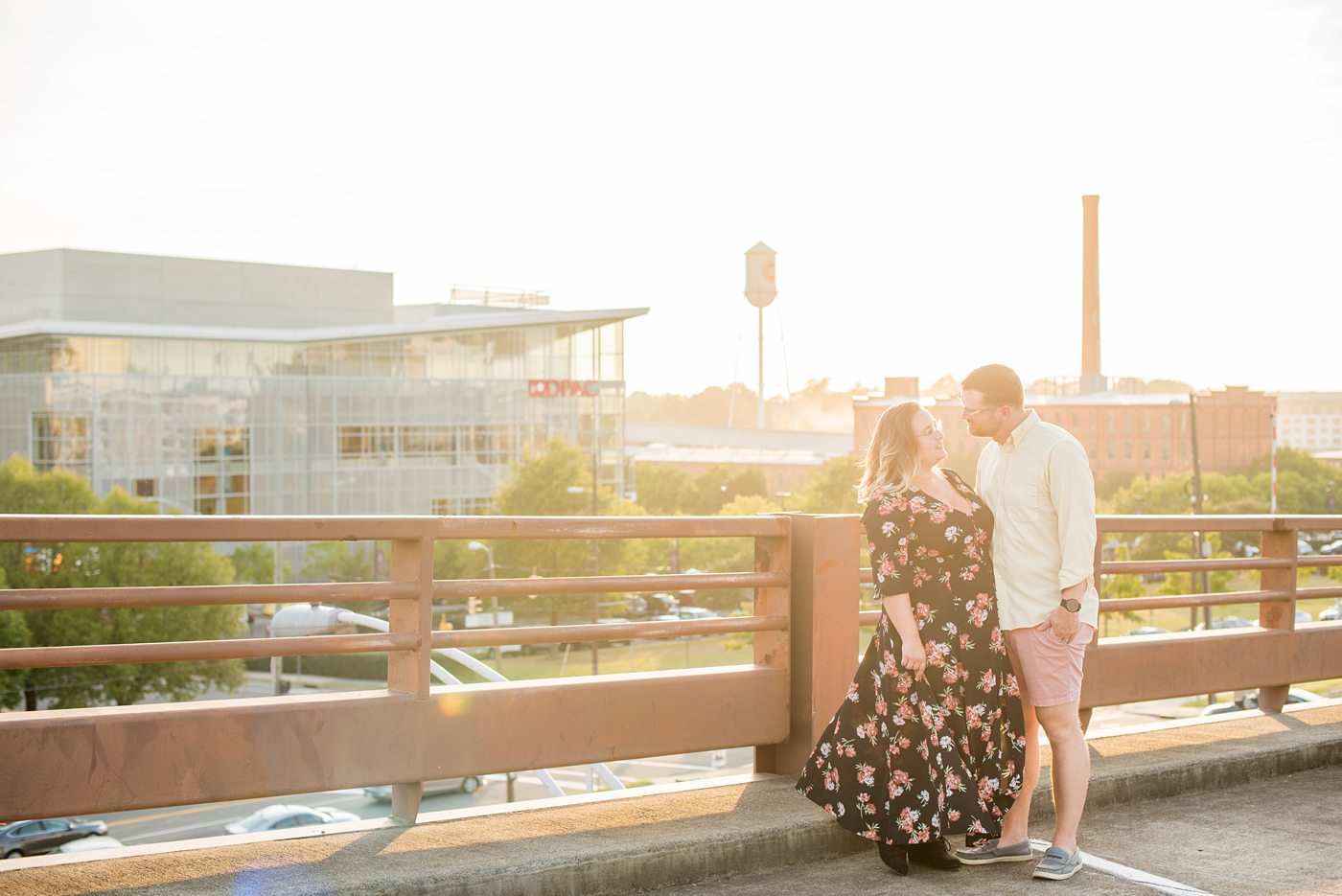 Durham North Carolina wedding photographer, Mikkel Paige Photography, captures engagement-like photos for a couple in the downtown area of this NC city for a two year anniversary couples session with Nikki and her husband, Jason, of Fancy This Photography. #mikkelpaige #DurhamEngagementPhotos #durhamphotographysession #DowntownDurham #DurhamWeddingPhotographer