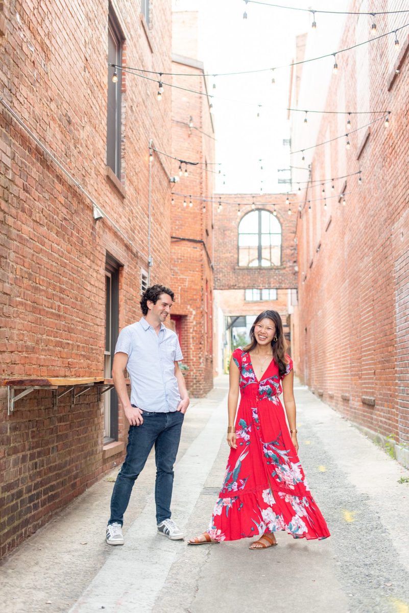 Durham North Carolina wedding photographer, Mikkel Paige Photography, captures engagement photos for a couple in the downtown area of the NC city. #mikkelpaige #DurhamEngagementPhotos #DowntownDurham #DurhamWeddingPhotographer