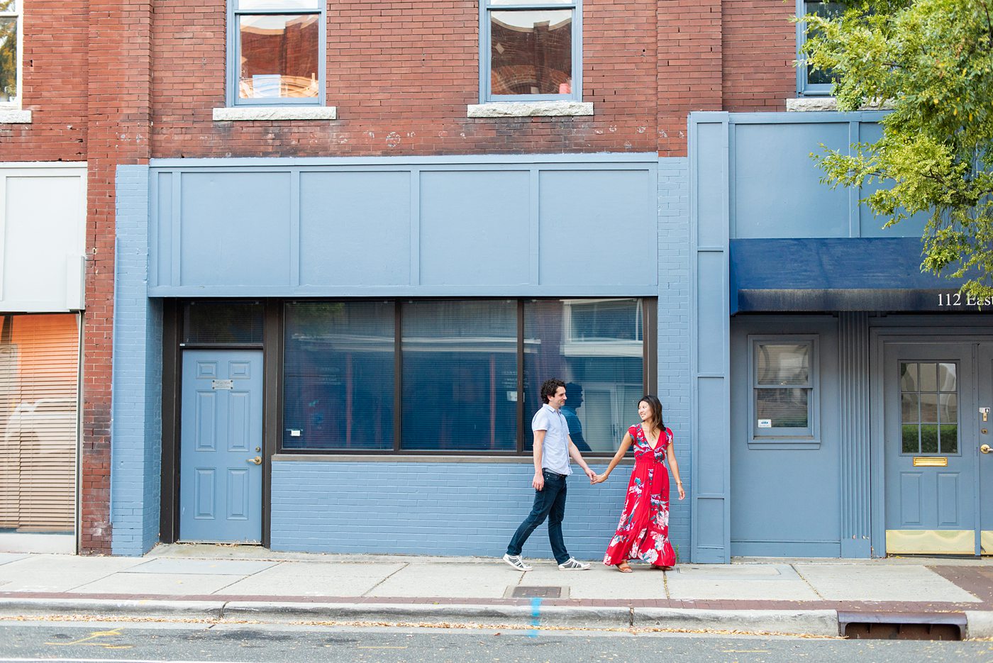 Durham North Carolina wedding photographer, Mikkel Paige Photography, captures engagement photos for a couple in the downtown area of the NC city. #mikkelpaige #DurhamEngagementPhotos #DowntownDurham #DurhamWeddingPhotographer