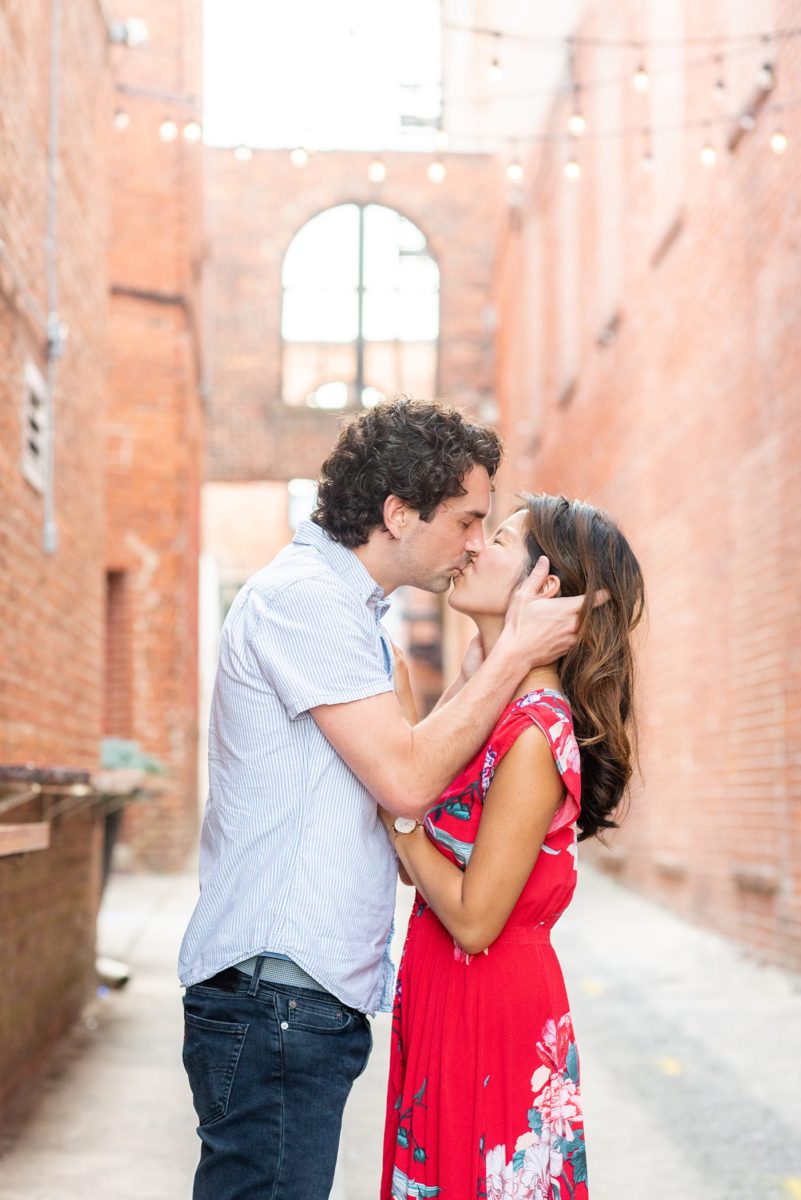 Durham North Carolina wedding photographer, Mikkel Paige Photography, captures engagement photos for a couple in the downtown area of the NC city. #mikkelpaige #DurhamEngagementPhotos #DowntownDurham #DurhamWeddingPhotographer
