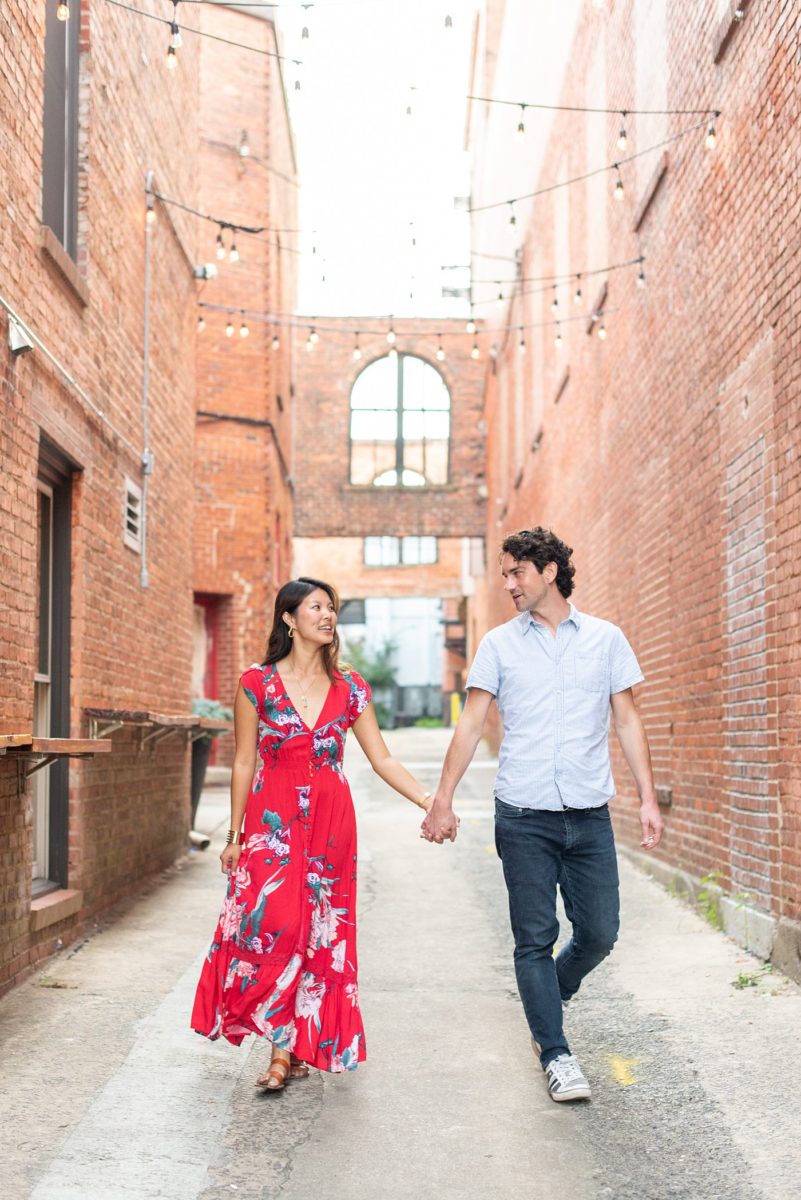 Durham North Carolina wedding photographer, Mikkel Paige Photography, captures engagement photos for a couple in the downtown area of the NC city. #mikkelpaige #DurhamEngagementPhotos #DowntownDurham #DurhamWeddingPhotographer