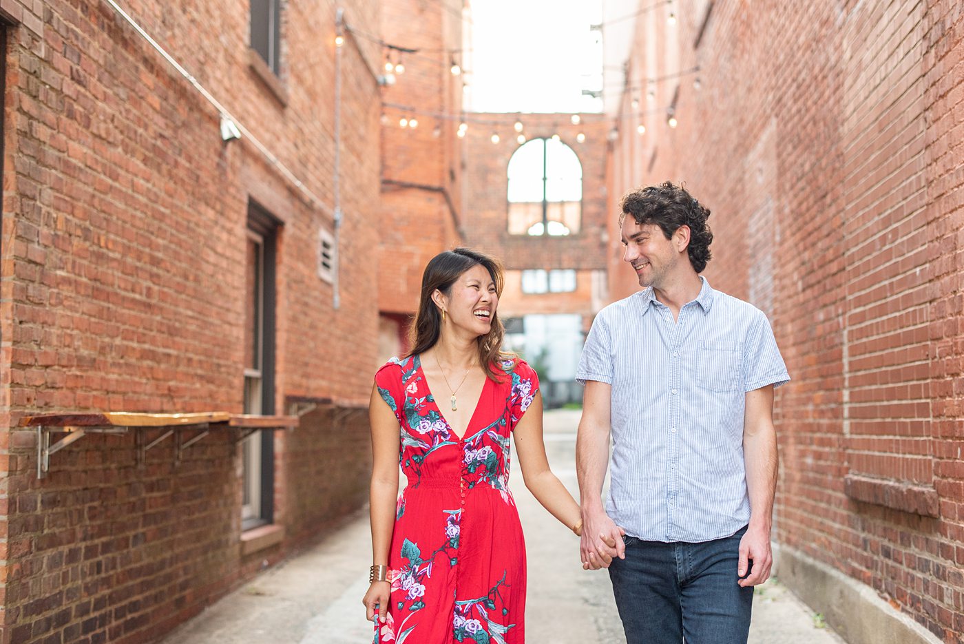 Durham North Carolina wedding photographer, Mikkel Paige Photography, captures engagement photos for a couple in the downtown area of the NC city. #mikkelpaige #DurhamEngagementPhotos #DowntownDurham #DurhamWeddingPhotographer