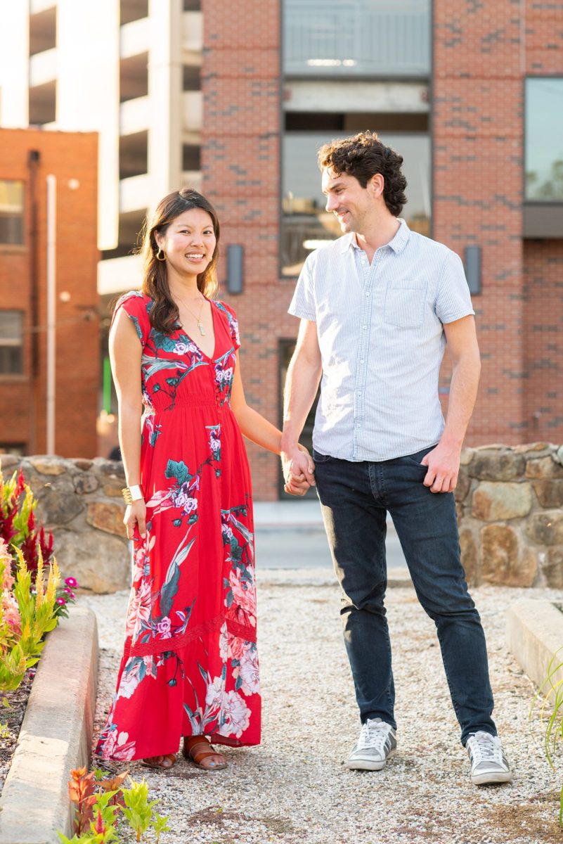 Durham North Carolina wedding photographer, Mikkel Paige Photography, captures engagement photos for a couple in the downtown area of the NC city. #mikkelpaige #DurhamEngagementPhotos #DowntownDurham #DurhamWeddingPhotographer