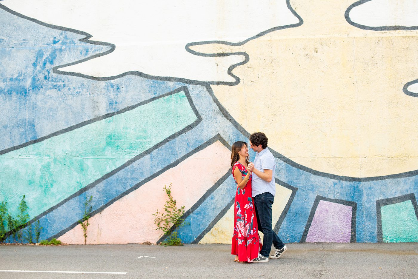 Durham North Carolina wedding photographer, Mikkel Paige Photography, captures engagement photos for a couple in the downtown area of the NC city. #mikkelpaige #DurhamEngagementPhotos #DowntownDurham #DurhamWeddingPhotographer