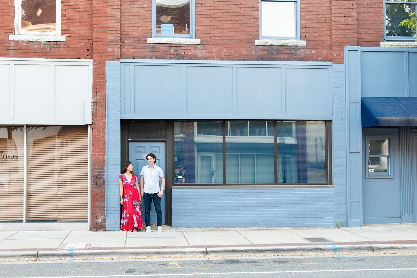 Durham North Carolina wedding photographer, Mikkel Paige Photography, captures engagement photos for a couple in the downtown area of the NC city. #mikkelpaige #DurhamEngagementPhotos #DowntownDurham #DurhamWeddingPhotographer