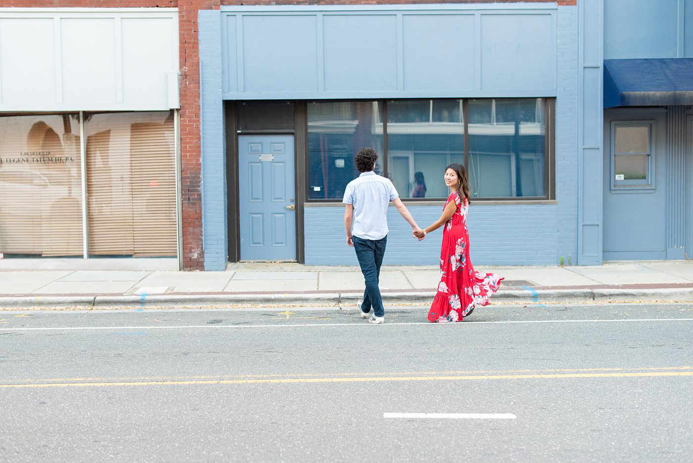 Durham North Carolina wedding photographer, Mikkel Paige Photography, captures engagement photos for a couple in the downtown area of the NC city. #mikkelpaige #DurhamEngagementPhotos #DowntownDurham #DurhamWeddingPhotographer