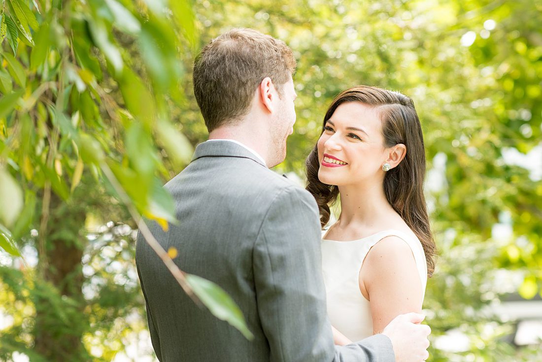 Photographs were taken by Mikkel Paige Photography for a fall wedding in upstate New York, just outside NYC, in Chappaqua, Westchester County. The bride and groom got married at Crabtree's Kittle House outdoors with an indoor reception. It was filled with pumpkins, autumn leaves, orange, white, peach and navy colors. The bride's gown had a long train and back bow. #mikkelpaige #fallwedding #newyorkweddingvenues #upstatenewyorkweddingvenues #nycweddingphotographer #BrideStyle #autumnbouquet