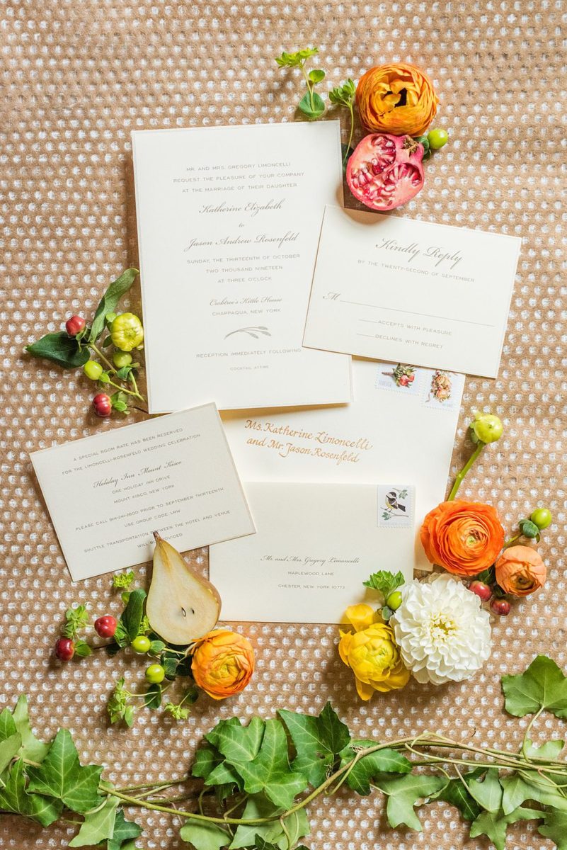 Fall wedding in upstate New York, just outside NYC, in Chappaqua, Westchester County. The wedding at Crabtree's Kittle House had an outdoor ceremony then reception indoors. It was filled with pumpkins, autumn leaves, orange, white, and peach colors. Detail invitation photo for the bride and groom taken by Mikkel Paige Photography. #mikkelpaige #fallwedding #newyorkweddingvenues #nycweddingphotographer #outdoorceremony #autumnwedding #weddinginvitation #weddingstationery