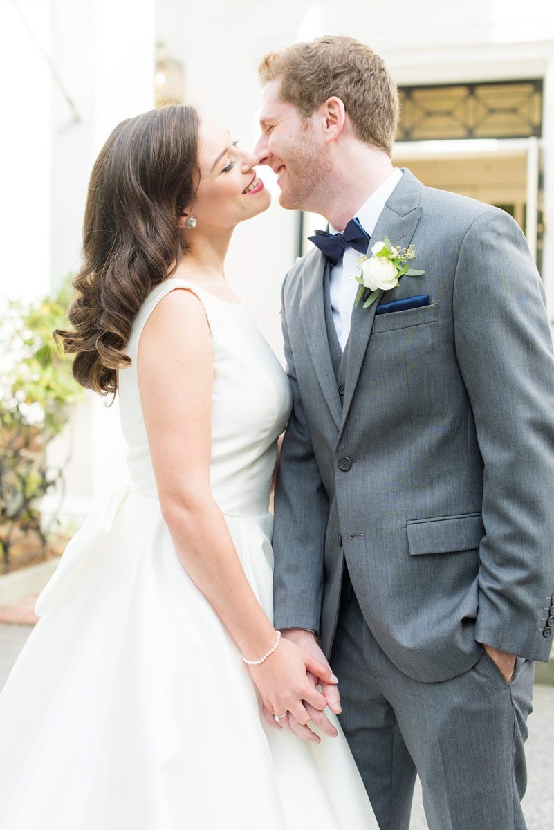 Photographs were taken by Mikkel Paige Photography for a fall wedding in upstate New York, just outside NYC, in Chappaqua, Westchester County. The bride and groom got married at Crabtree's Kittle House outdoors with an indoor reception. It was filled with pumpkins, autumn leaves, orange, white, peach and navy colors. The bride's gown had a long train and back bow. #mikkelpaige #fallwedding #newyorkweddingvenues #upstatenewyorkweddingvenues #nycweddingphotographer #BrideStyle #autumnbouquet